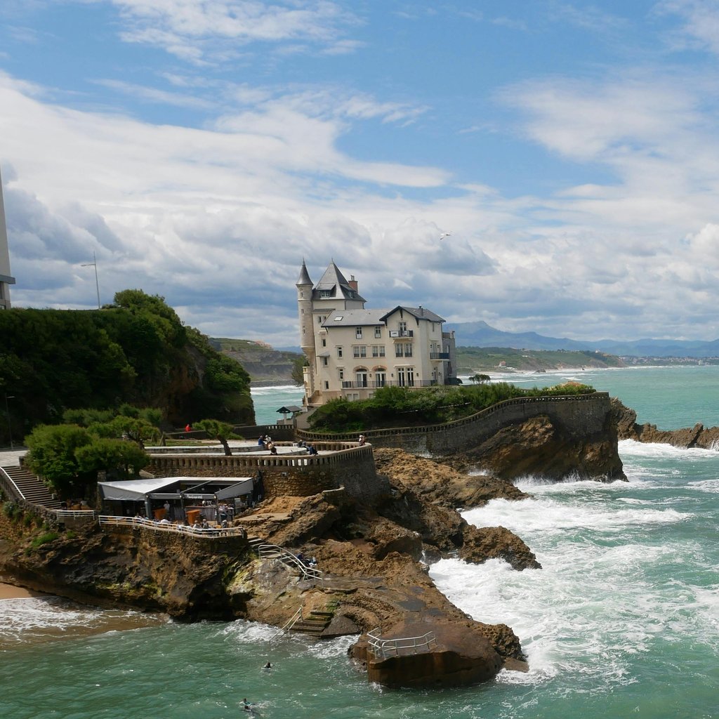 Villa Belza overlooking the vibrant coast of Biarritz, France, a perfect blend of nature and architecture.