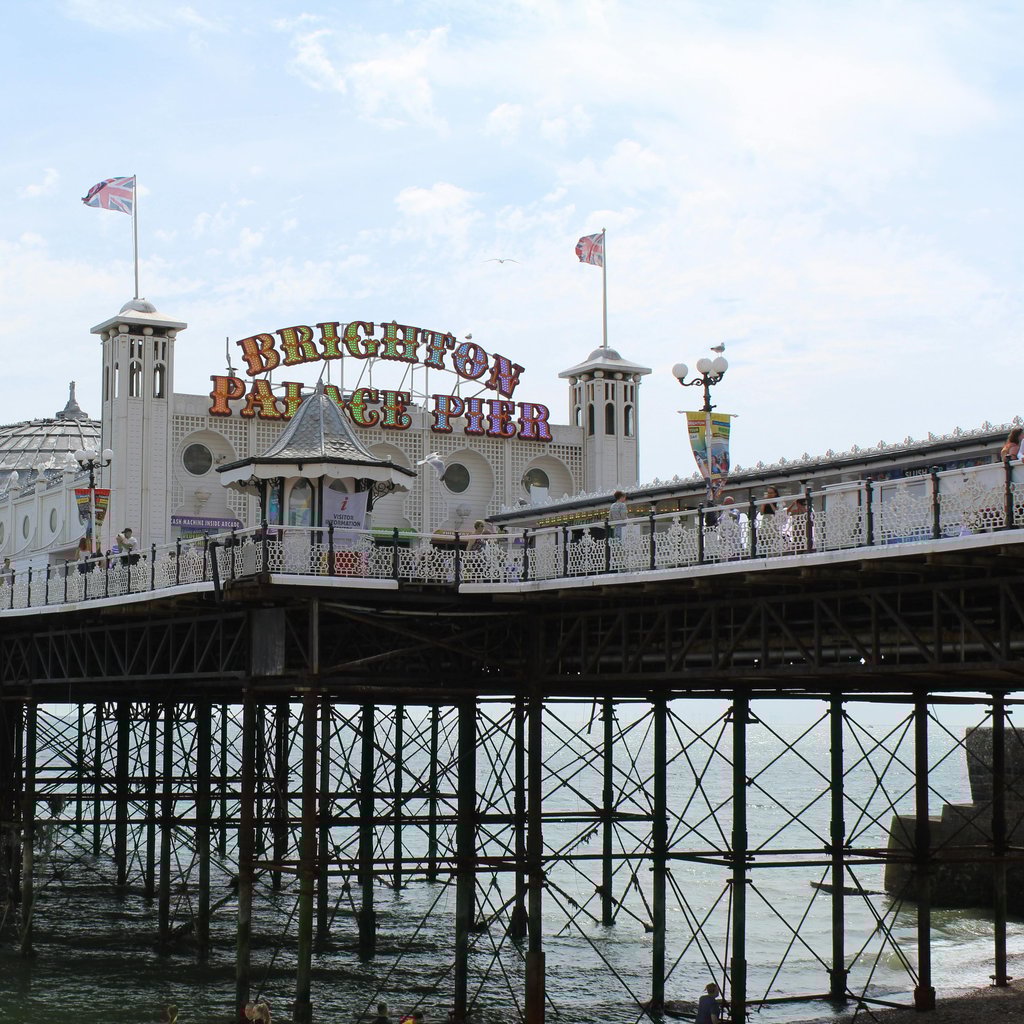 Explore the iconic Brighton Palace Pier in England, set against a stunning seaside backdrop.