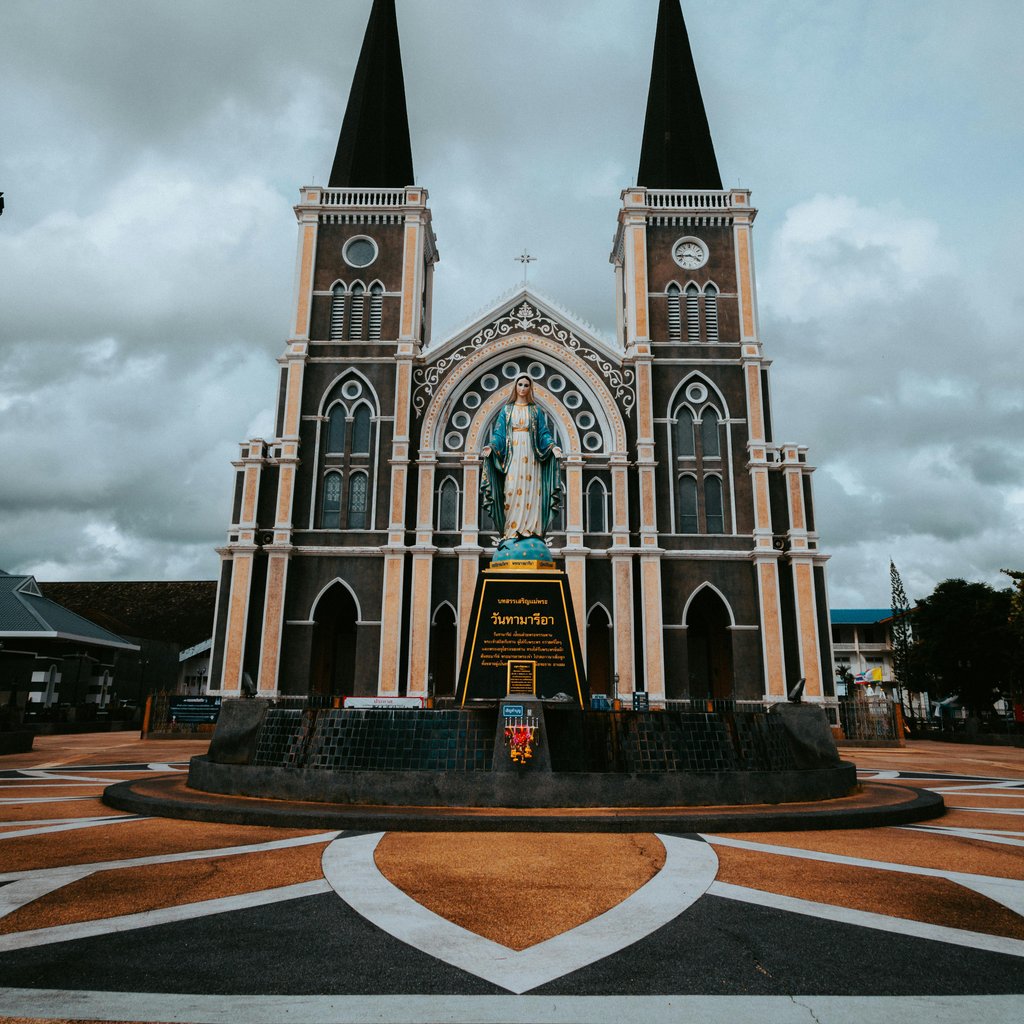 Stunning low-angle view of gothic cathedral facade in Thailand