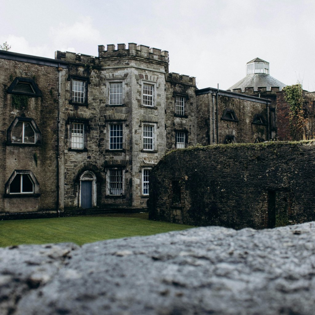Explore the historic stone architecture of Cork City Gaol, a prominent Irish landmark.
