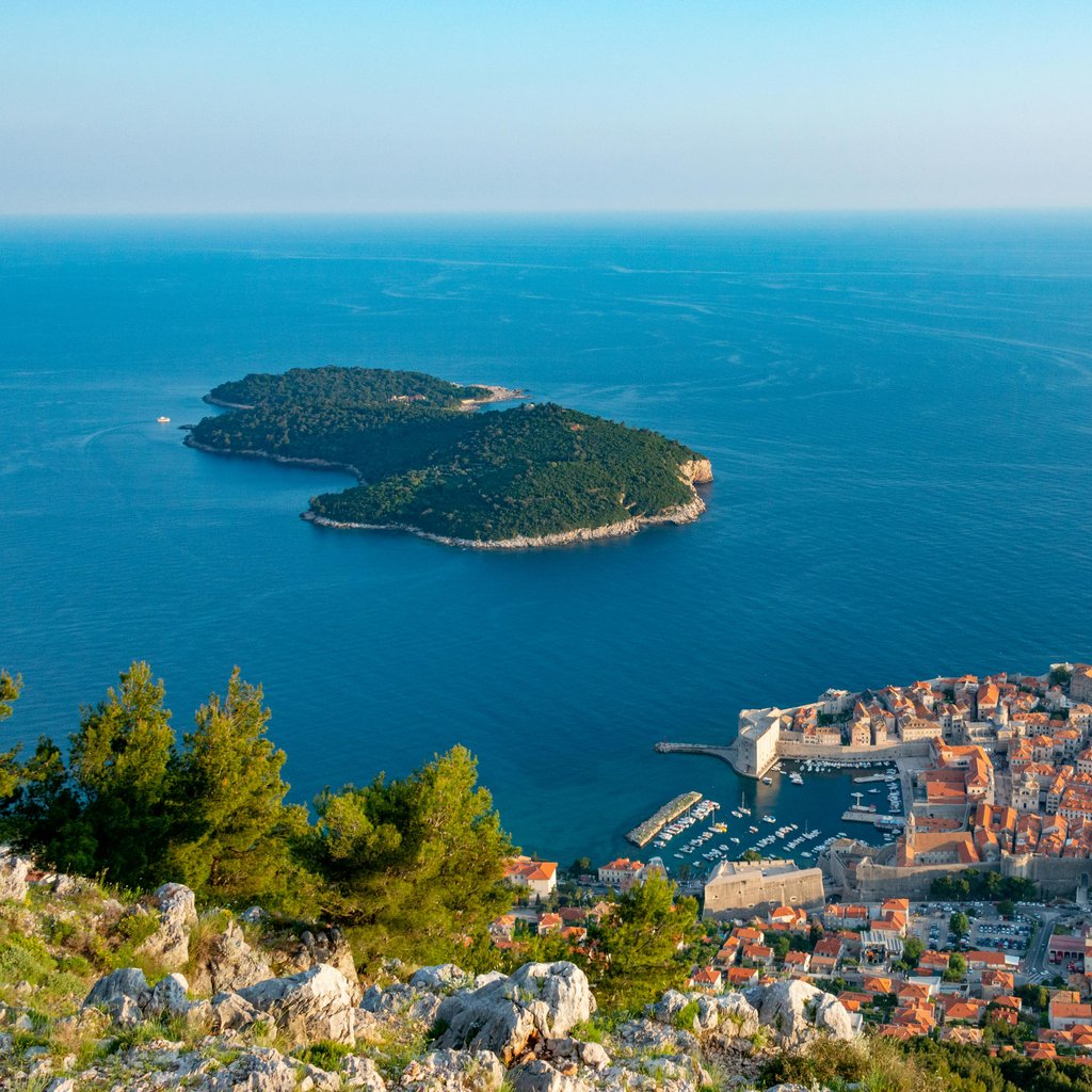Stunning aerial view of Dubrovnik's Old Town and Adriatic Sea in summer.