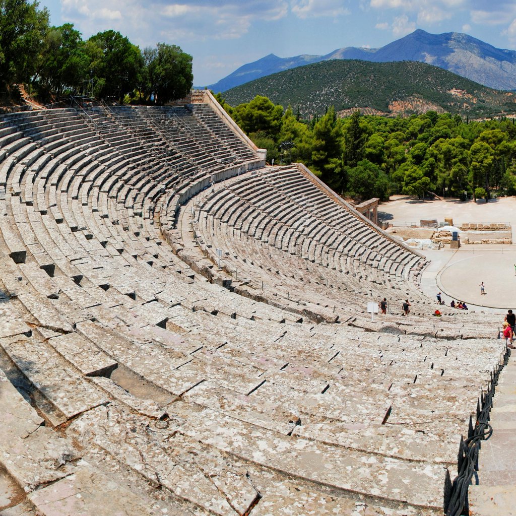 Stunning panoramic view of the ancient Epidaurus theater surrounded by lush greenery.