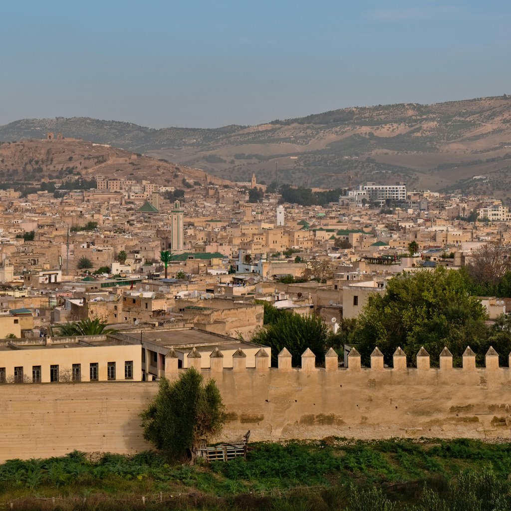 Explore the historic cityscape of Fes, Morocco, showcasing its unique architecture and sprawling urban landscape.