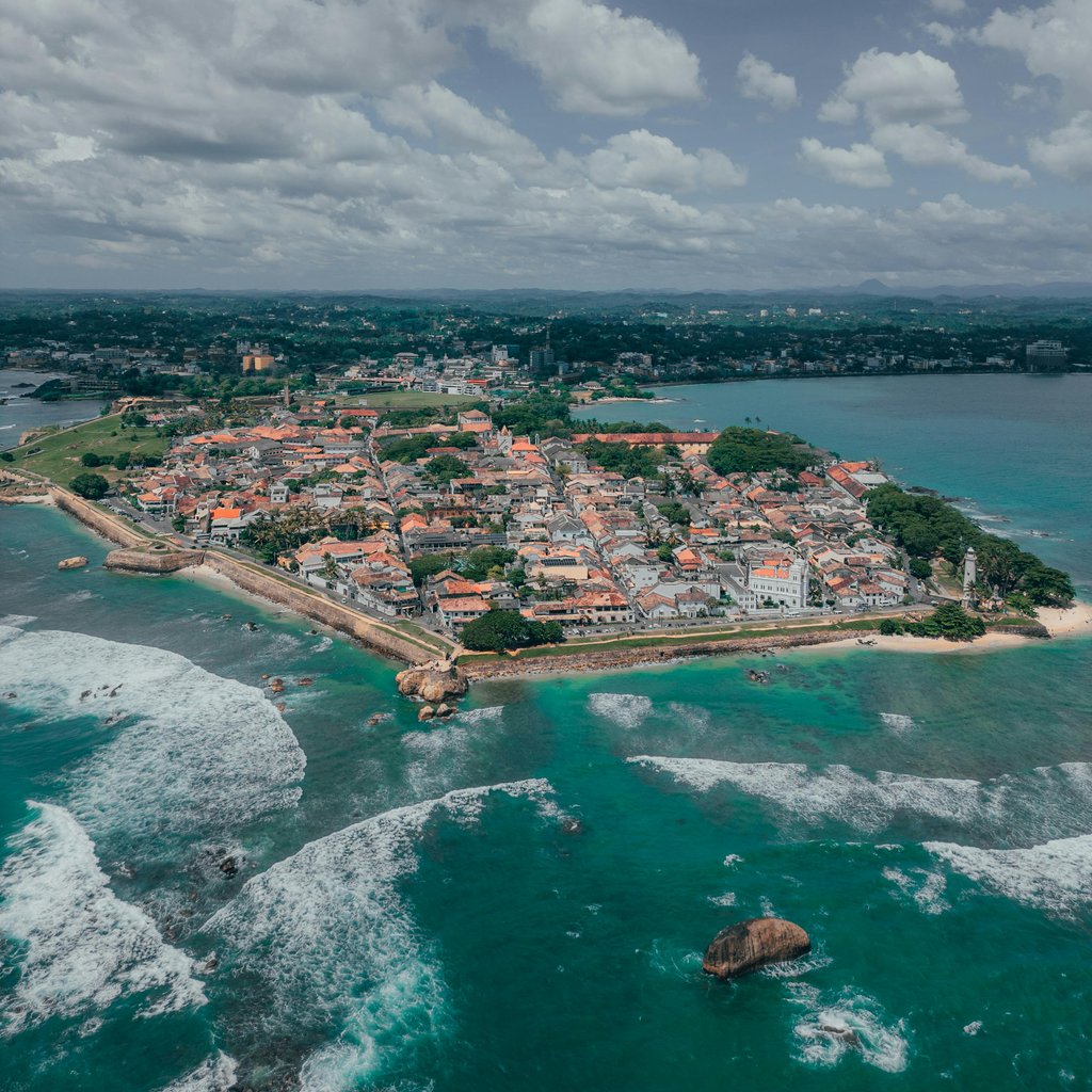 Stunning aerial capture of Galle Fort and its coastline in Sri Lanka, showcasing rich history and vibrant seascapes.
