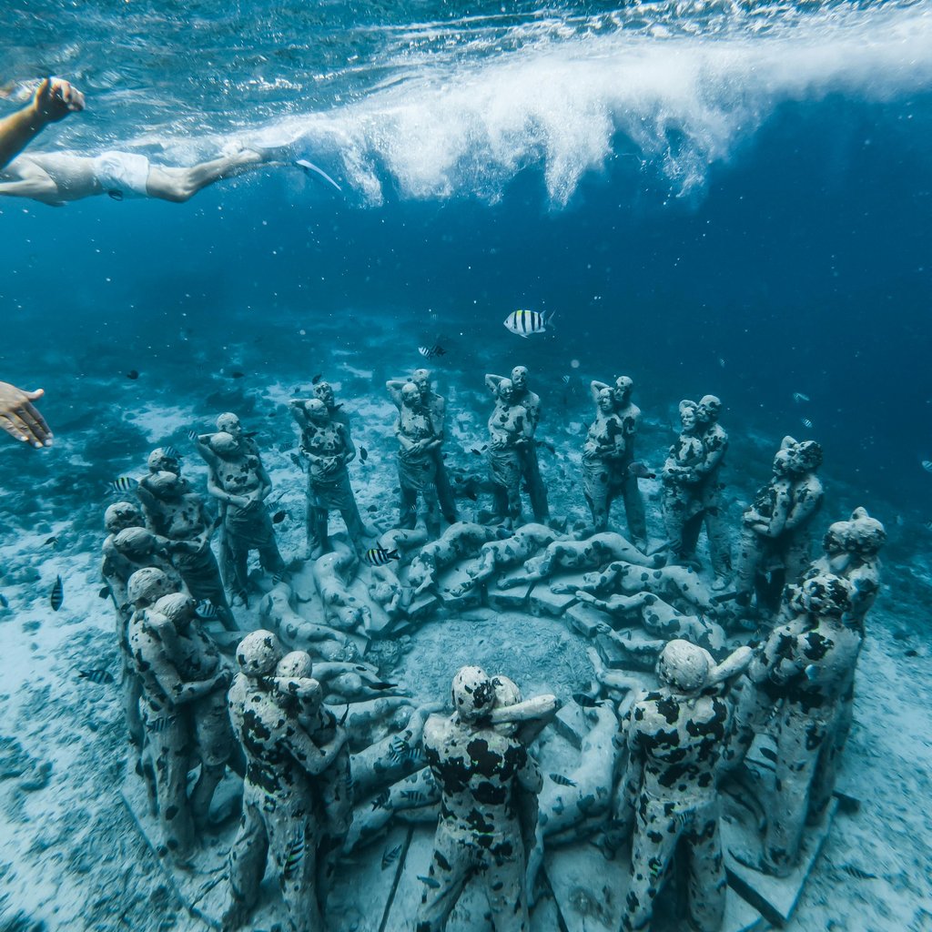 Submerged sculptures in Nusa Tenggara's vibrant sea, perfect for underwater exploration.