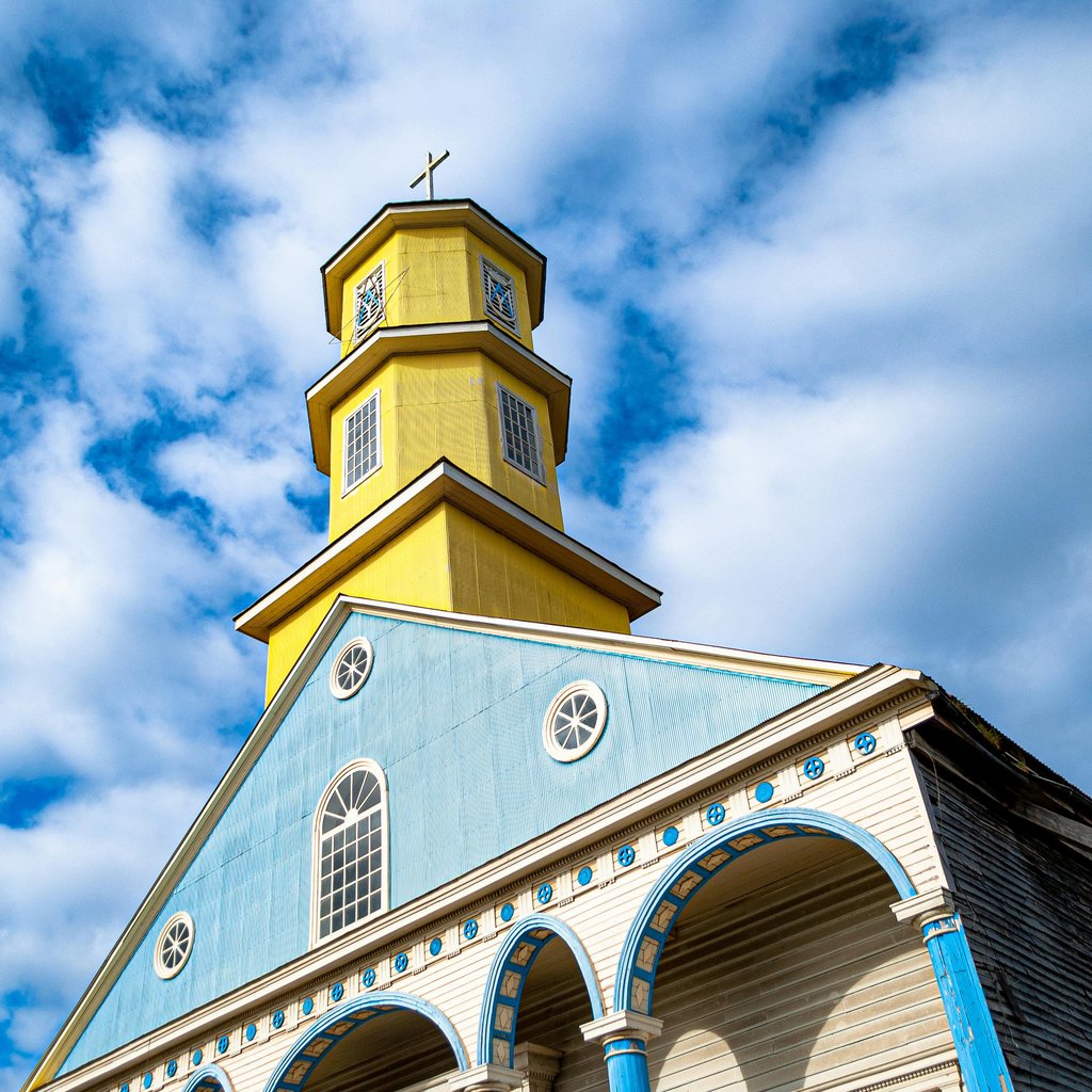 Colorful church in Chile Chico with striking architecture under a bright sky.