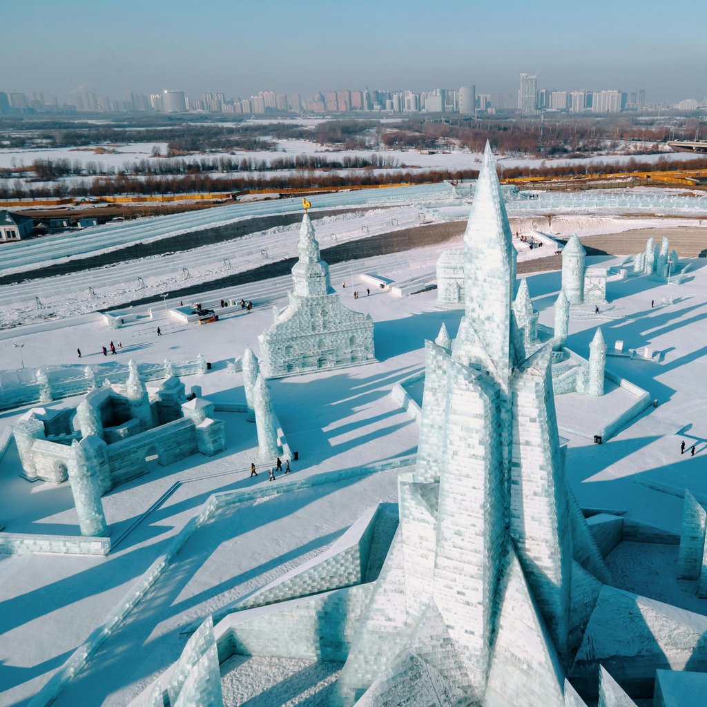 Stunning aerial view of ice sculptures at Harbin Ice Festival, China during winter.