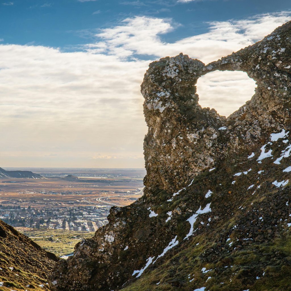 A stunning rock formation overlooking Hveragerði, Iceland's scenic landscape.