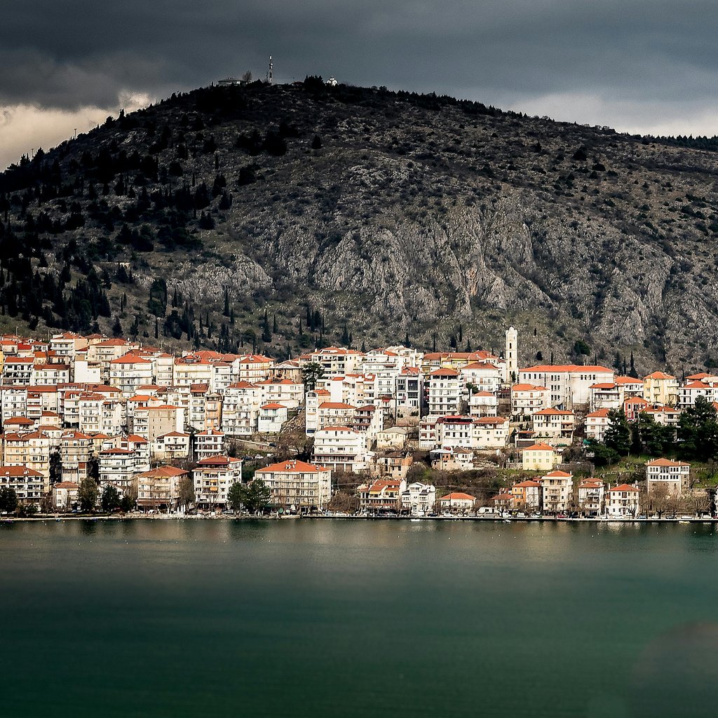 Picturesque view of Kastoria, Greece with lake and mountains.