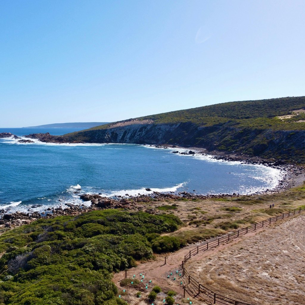 Serene aerial view of Yallingup's coastline in Western Australia, showcasing its stunning beaches and natural beauty.