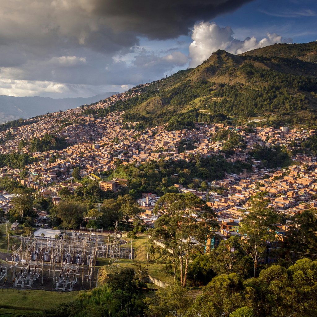Discover Medellin's urban landscape with sprawling hills and vibrant architecture.
