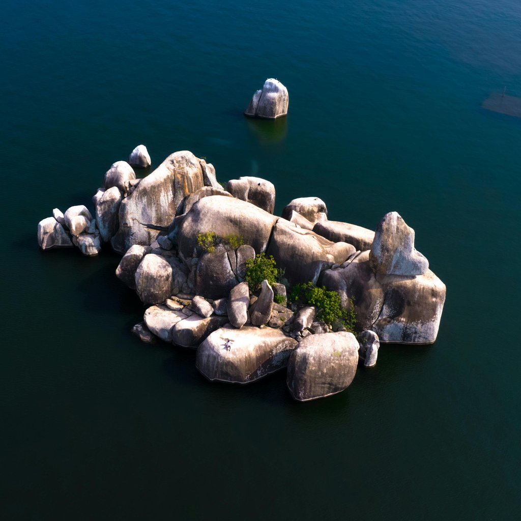Stunning aerial shot of unique rock formation in Lake Victoria, Mwanza.