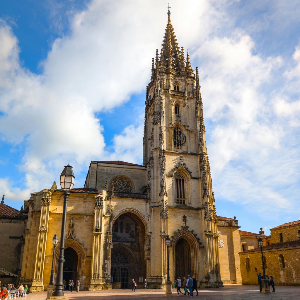 Stunning Gothic cathedral in Oviedo, Spain under a clear blue sky, exemplifying cultural heritage.