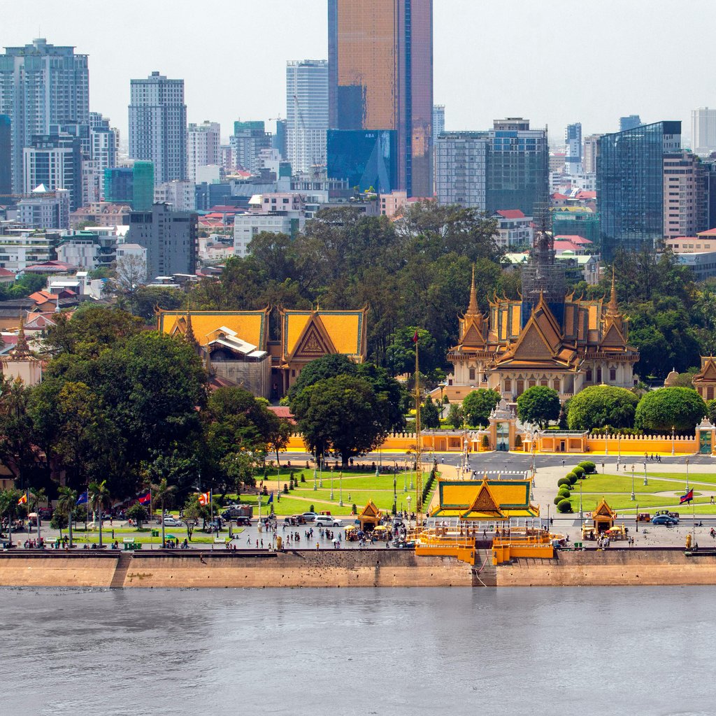 A captivating view of Phnom Penh skyline featuring the Royal Palace and modern architecture.