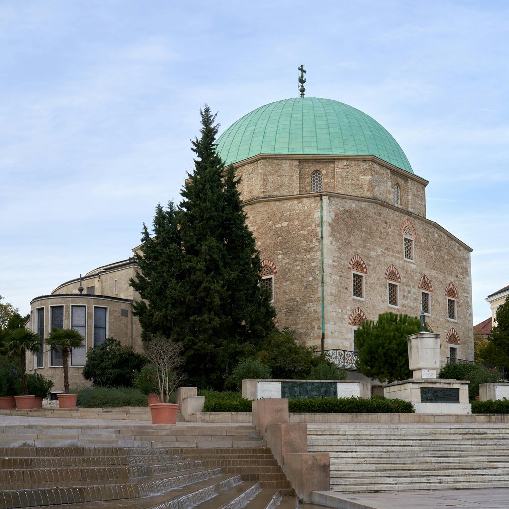 Historic Mosque of Pasha Qasim in Pécs, Hungary, showcasing Ottoman architecture.