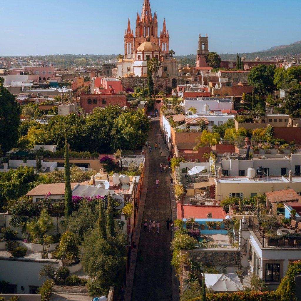 Discover San Miguel de Allende's stunning architecture and vibrant urban scene from above.