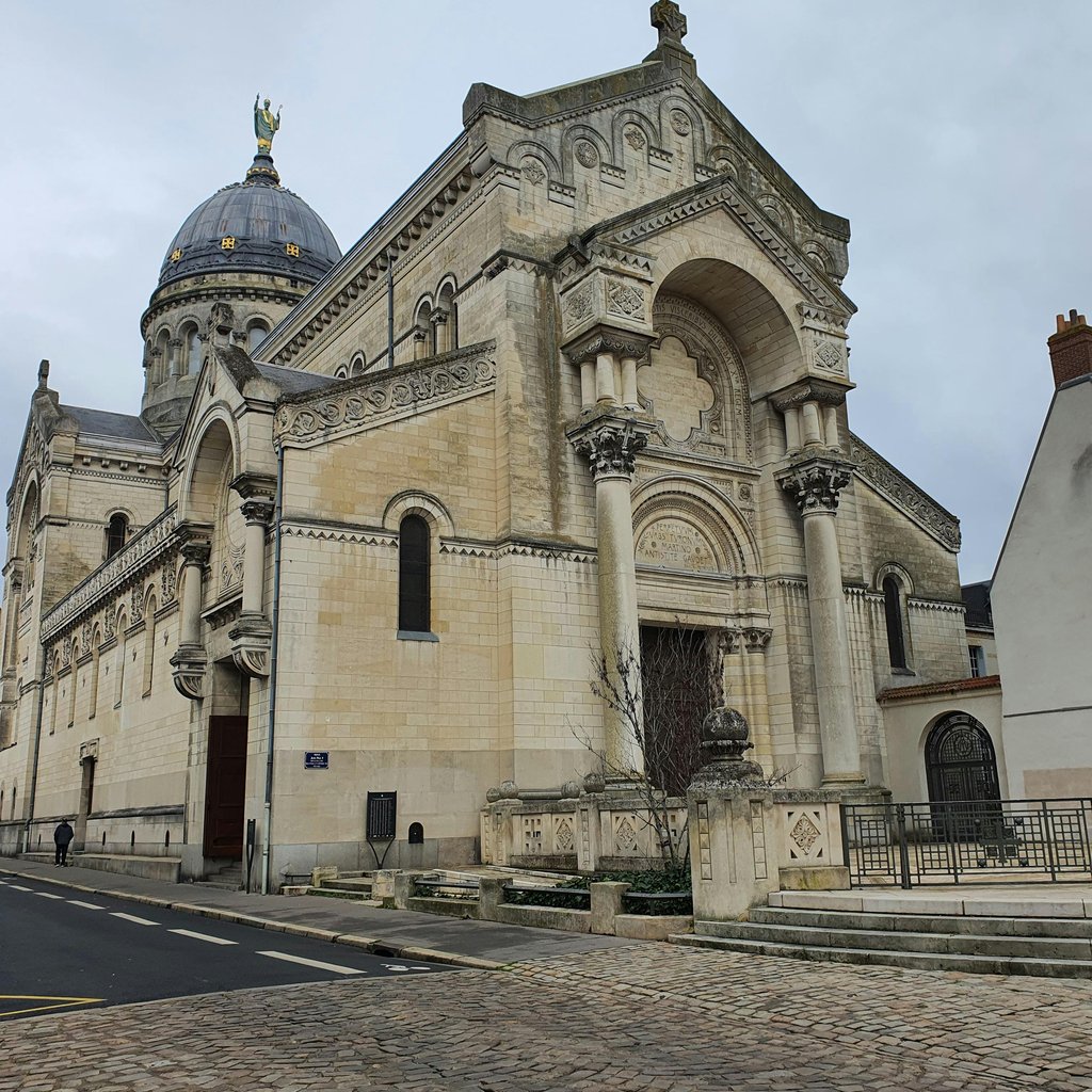 Captivating view of the Basilica of Saint Martin's architectural facade in Tours, France.