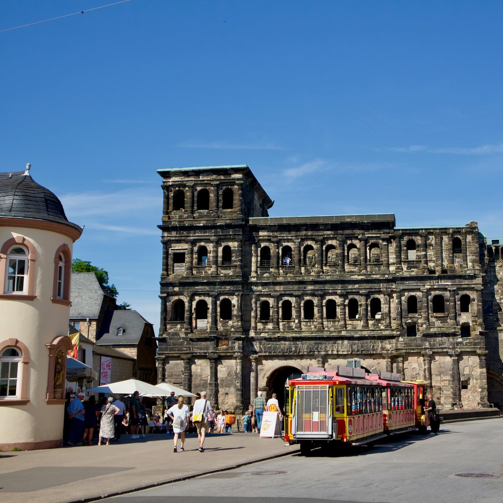 Explore Porta Nigra, the ancient Roman gate in Trier. A historic landmark captured beautifully on a sunny day.