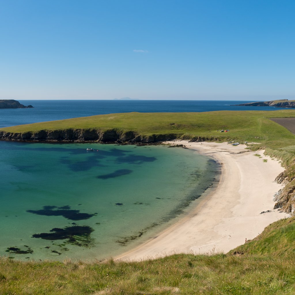 To the right is the Sands of Rerwick beach, Colsay Island is to the centre left and if you look closely, you can see seals in the water just offshore.