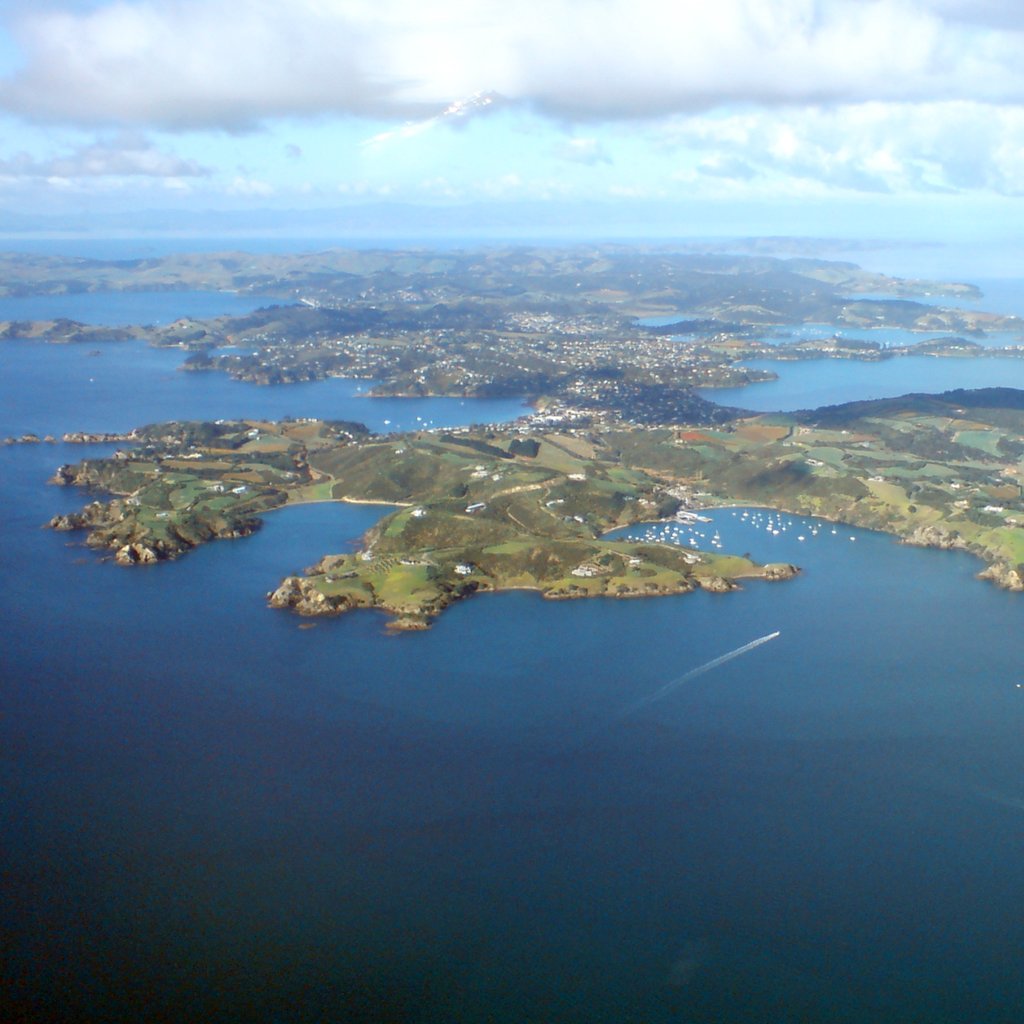 Waiheke Island, in the Hauraki Gulf of New Zealand, seen from a light airplane on the way to Great Barrier Island. Looking towards the east.